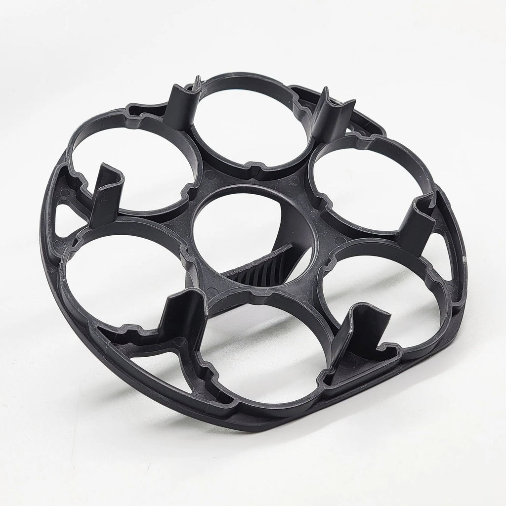 Black plastic egg holder basket with dimensions 13.8 by 12.6 cm.