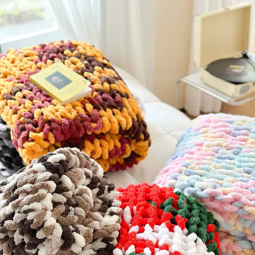 Thick striped chenille winter blanket laid flat, showing its 130x170cm size and handmade ice bar dyed pattern.