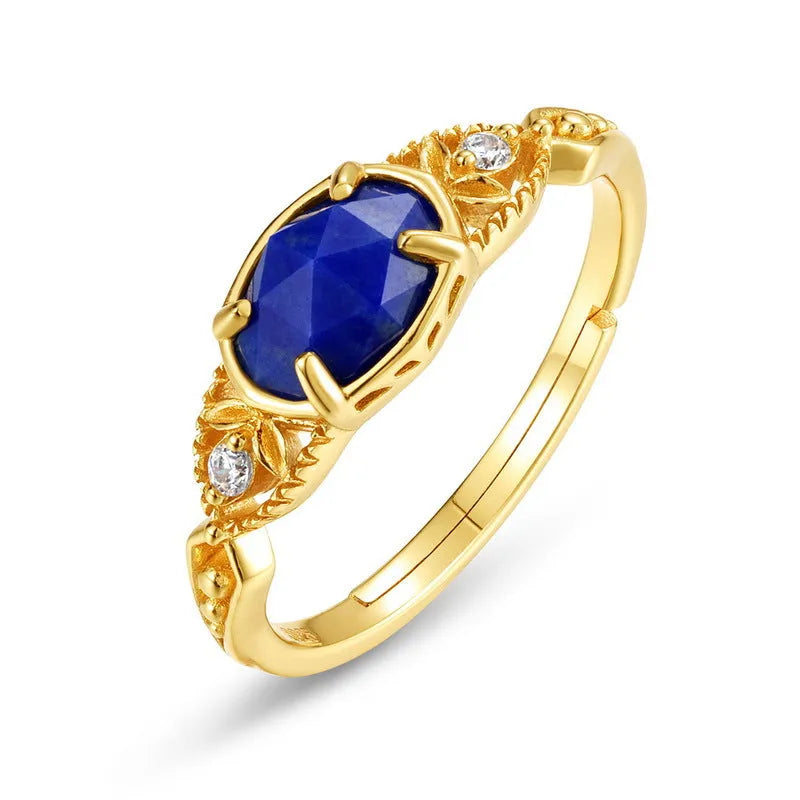 Geometric lapis lazuli silver ring with elliptical shape and round elements