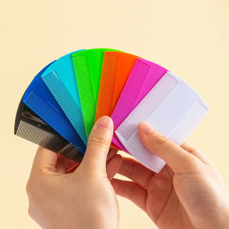 Plastic fine-toothed flea comb in assorted colours showing double-edged design for pet and human grooming
