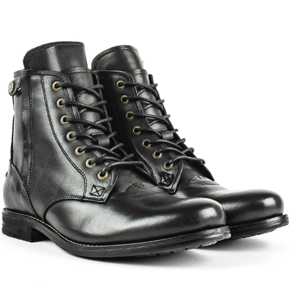 Men's black and brown two-tone leather ankle boots with side zip and low heel.