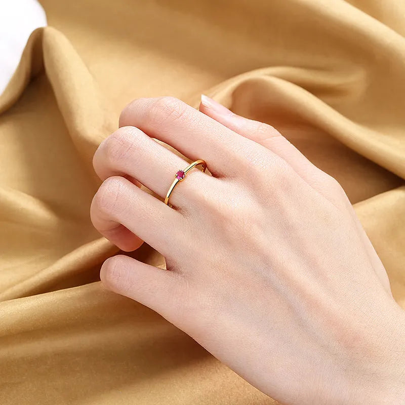 Women's fine copper circle ring with geometric design and single diamond in multiple colour options