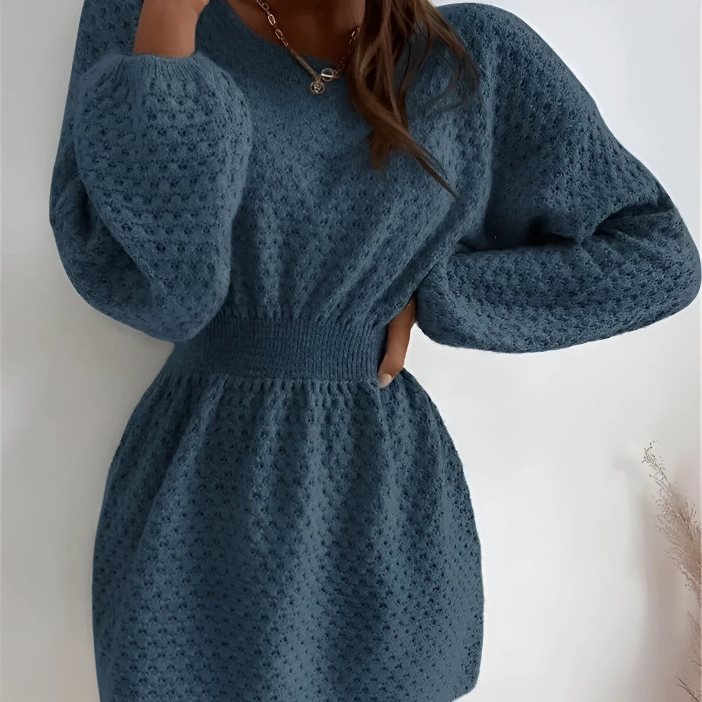 Blue slim-fit women's knitted dress with hand-crocheted flower detail on the front.