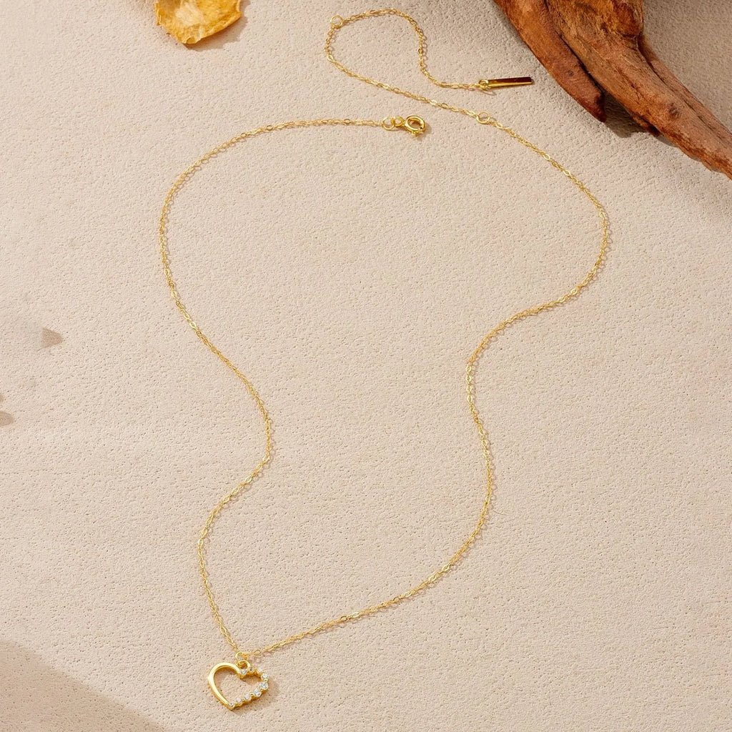 925 sterling silver hollow heart necklace with regular chain, available in white gold or platinum colour