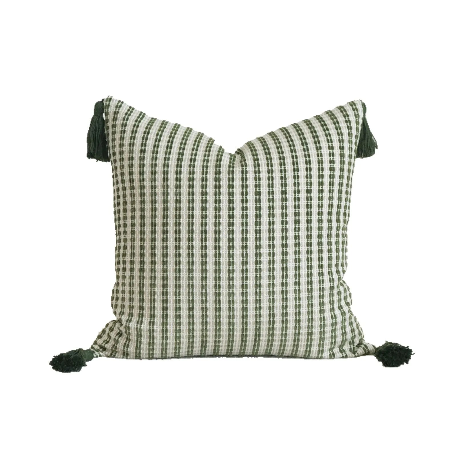 Green cotton and linen hotel sample pillow with tassel details and botanical patterns for display use
