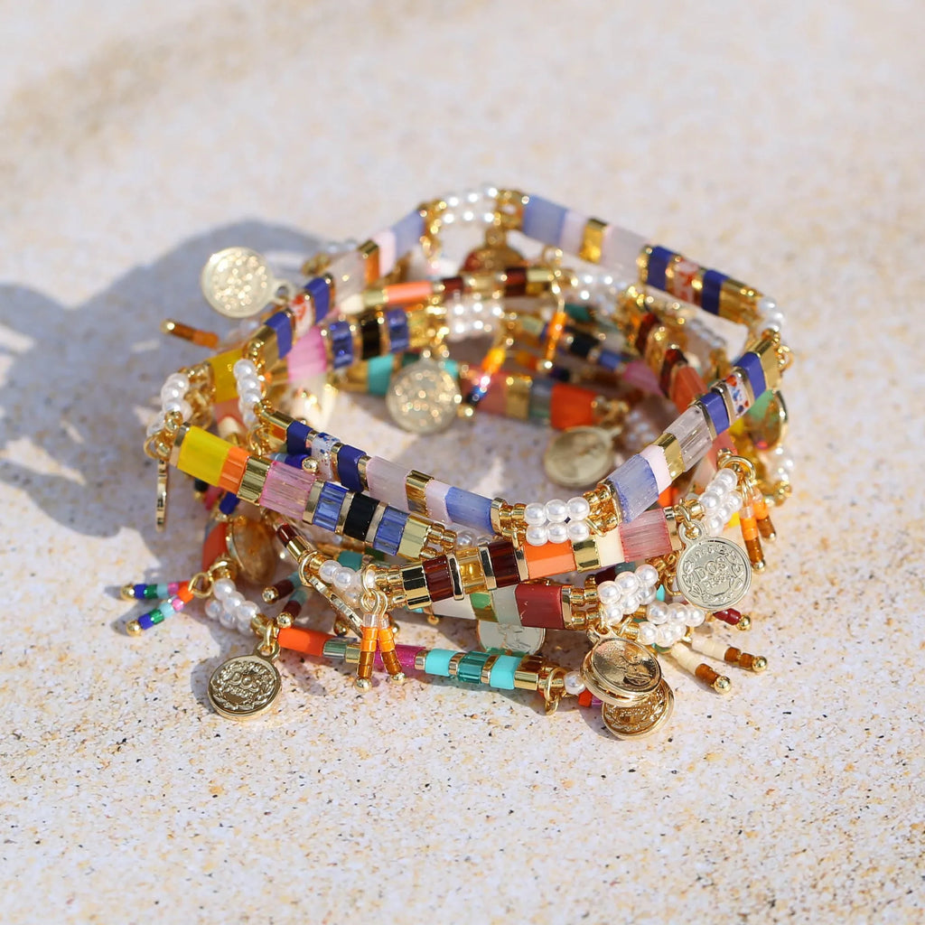 Handcrafted women's bracelet with imitation pearl beads in European style, showing colour variations.