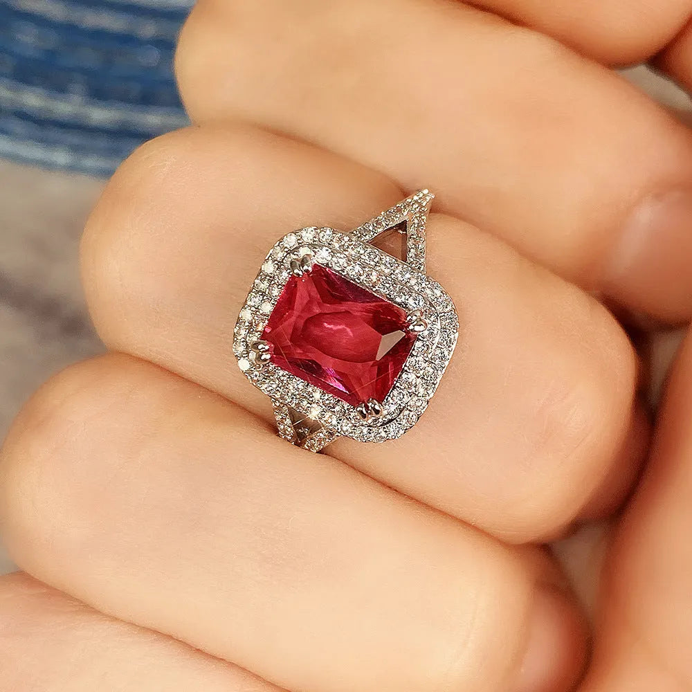 Copper women's ring with square red rhinestone on geometric princess-shaped band