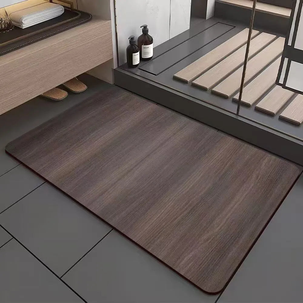 Square American style wood grain patterned diatom ooze bathroom floor mat on a tiled floor.