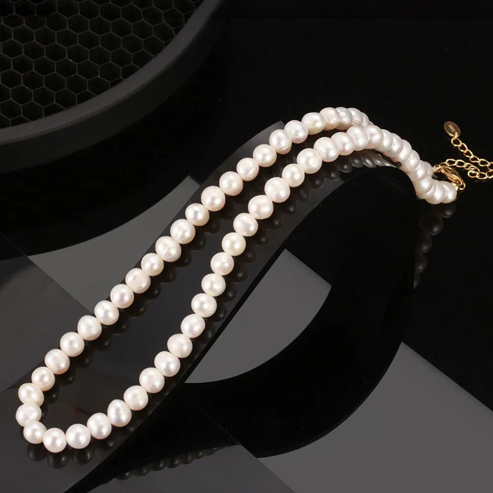 Women's adjustable freshwater pearl necklace in sterling silver with simple design