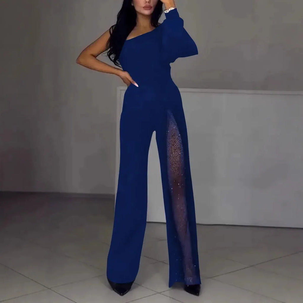 Women's black jumpsuit with an oblique asymmetric shoulder cut and a high slit on the leg.