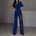 Women's black jumpsuit with an oblique asymmetric shoulder cut and a high slit on the leg.