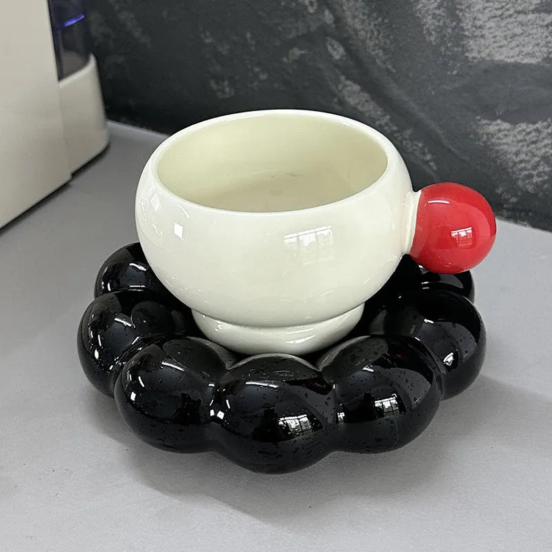 Nordic style ceramic coffee set with a 250ml cup and matching dish on a table.