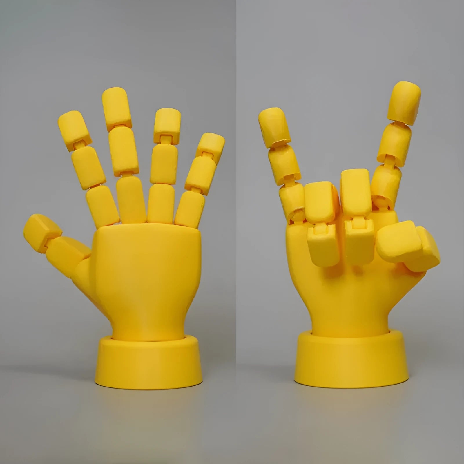 Yellow movable joint hand prop ornament made of PLA plastic on white background