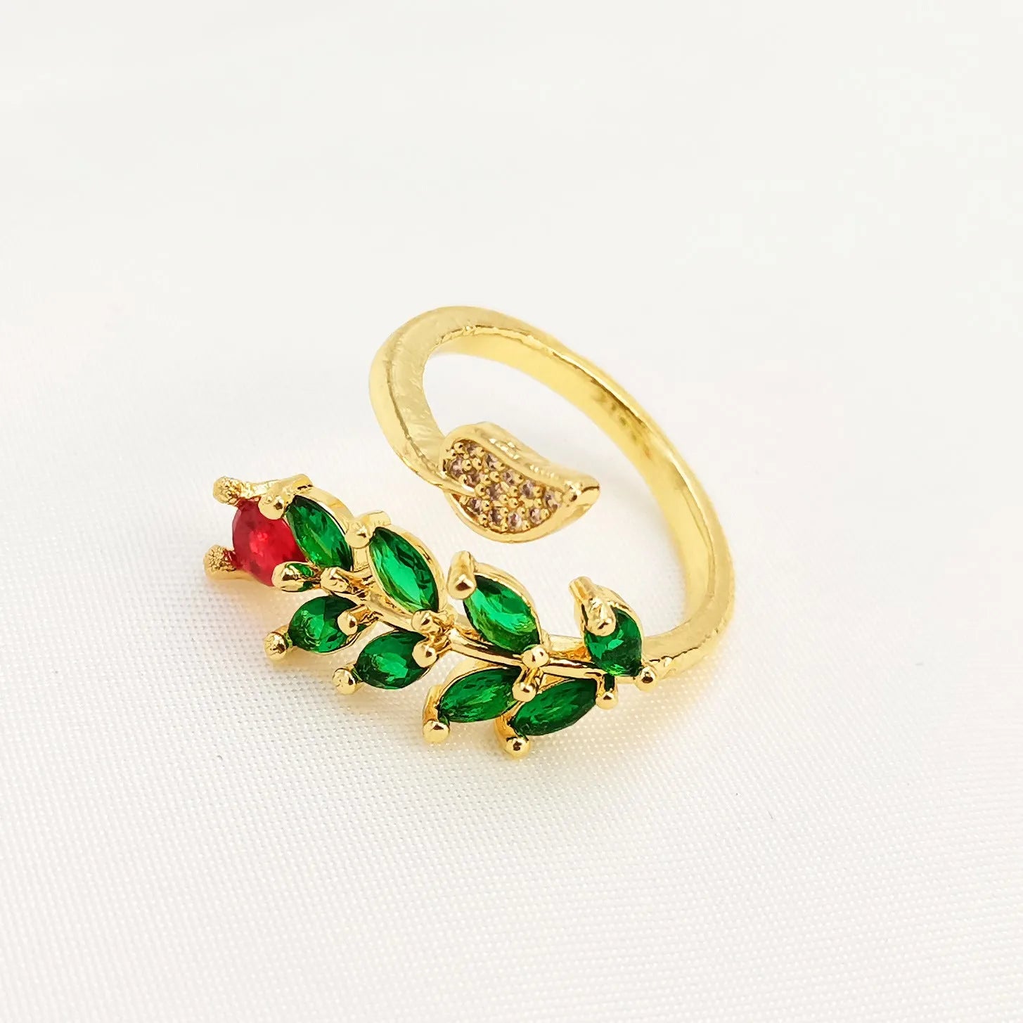 Women's geometric open ring with gold-plated copper construction, leaf design, and zircon crystal accents
