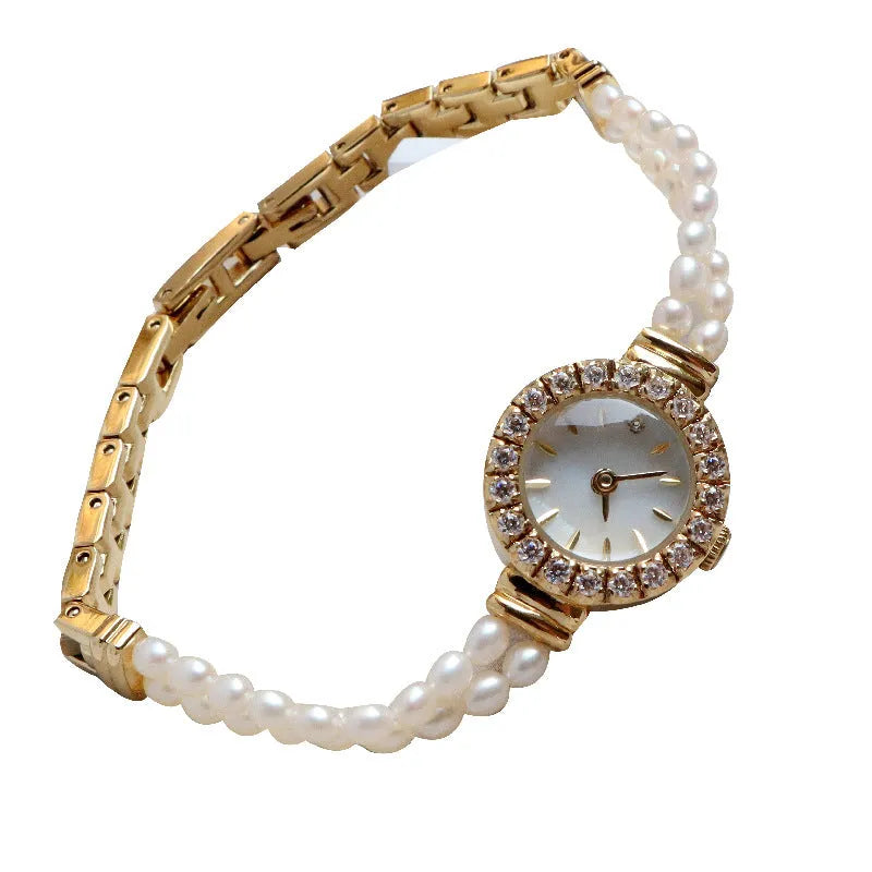 Women's light gold watch with freshwater pearl bracelet and 18mm round dial