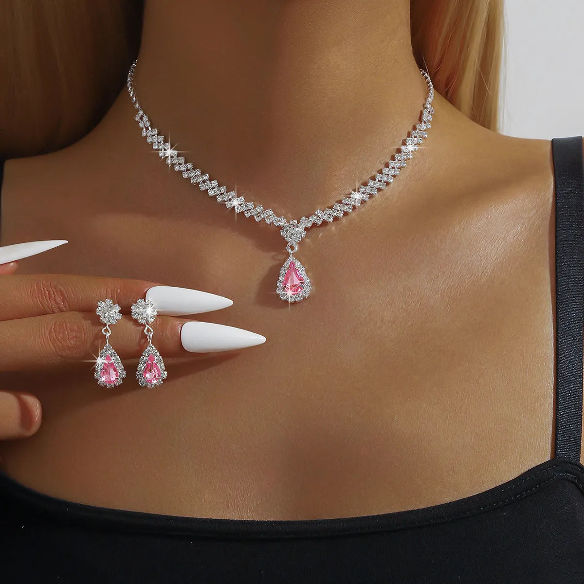 Women's claw chain necklace and earrings set with water drop rhinestones in multiple colour options