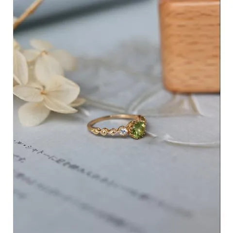 Japanese retro style geometric copper ring with quadrilateral imitation peridot stone.