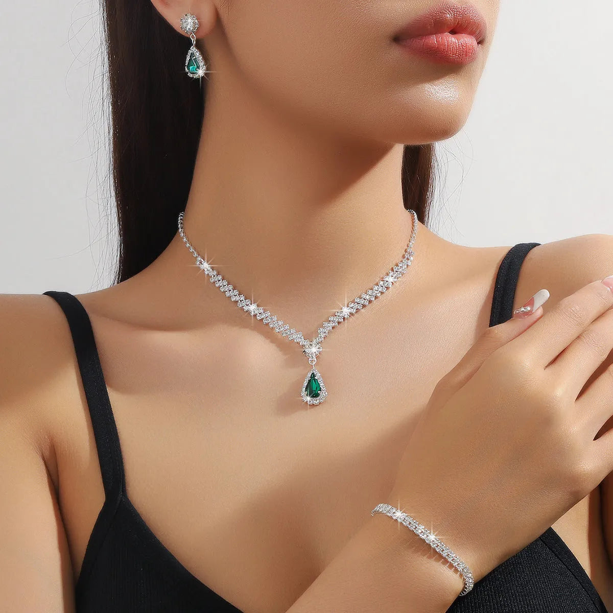 Women's claw chain necklace and earrings set with water drop rhinestones in multiple colour options