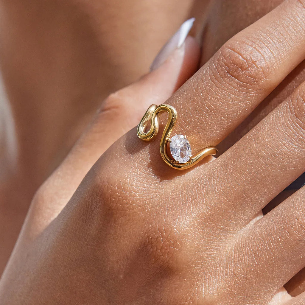 Geometry design titanium steel zircon ring on a hand, showing stainless steel band and contemporary styling.