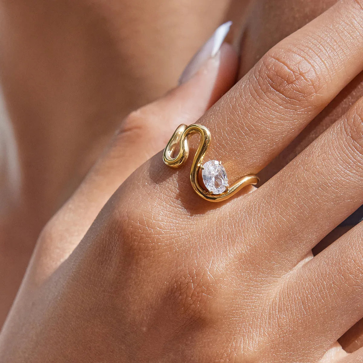 Geometry design titanium steel zircon ring on a hand, showing stainless steel band and contemporary styling.