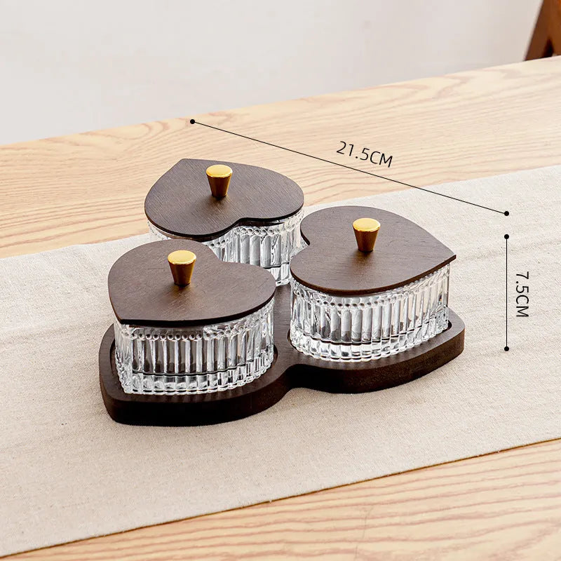 Glass retro serving platter with transparent heart-shaped lid showing multiple snack compartments
