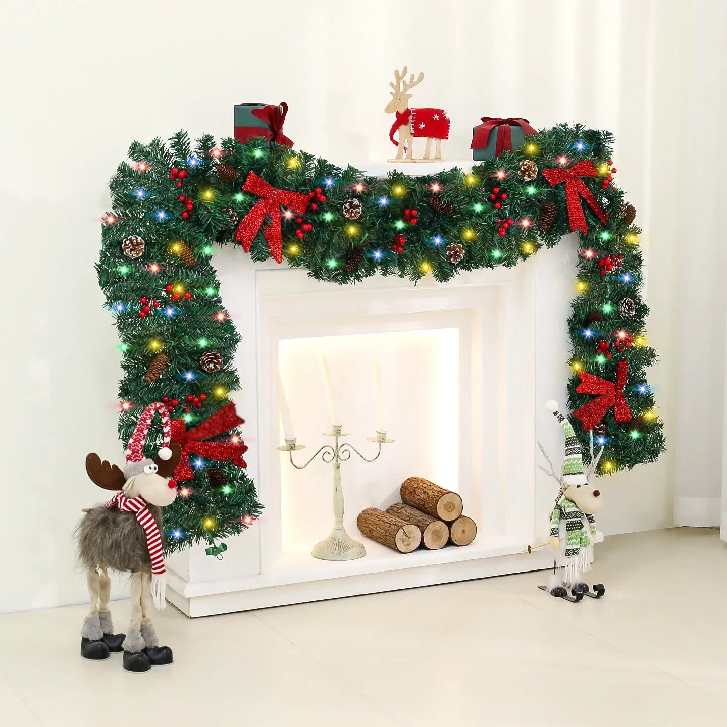 Christmas rattan pine cone bow decorative centrepiece with LED lighting on wooden table
