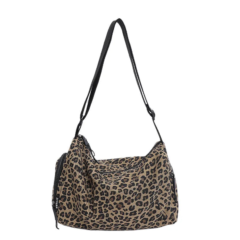 Leopard print sports style cross-body messenger bag with large capacity and shoulder strap