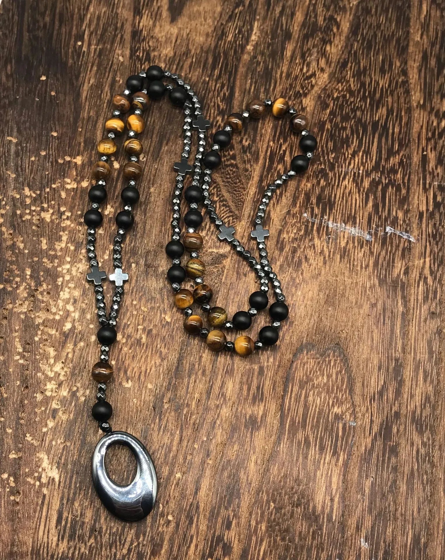 Men's stone cross pendant necklace with hand-woven detail on an 80cm ball bead chain.