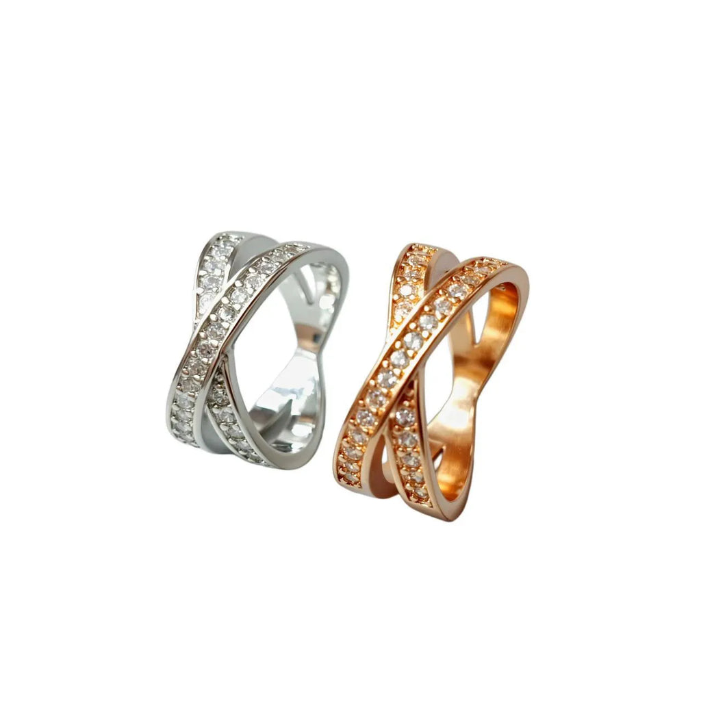 Electroplated copper cross ring with micro-inlaid zircon stones in silver finish