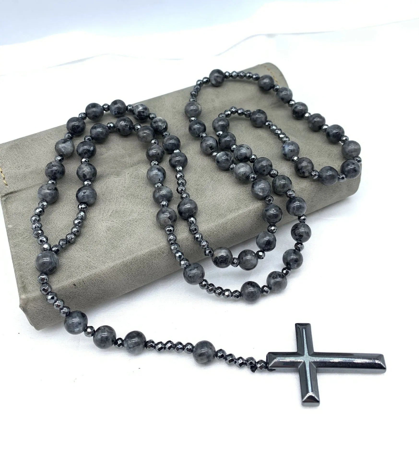 Men's stone cross pendant necklace with hand-woven detail on an 80cm ball bead chain.