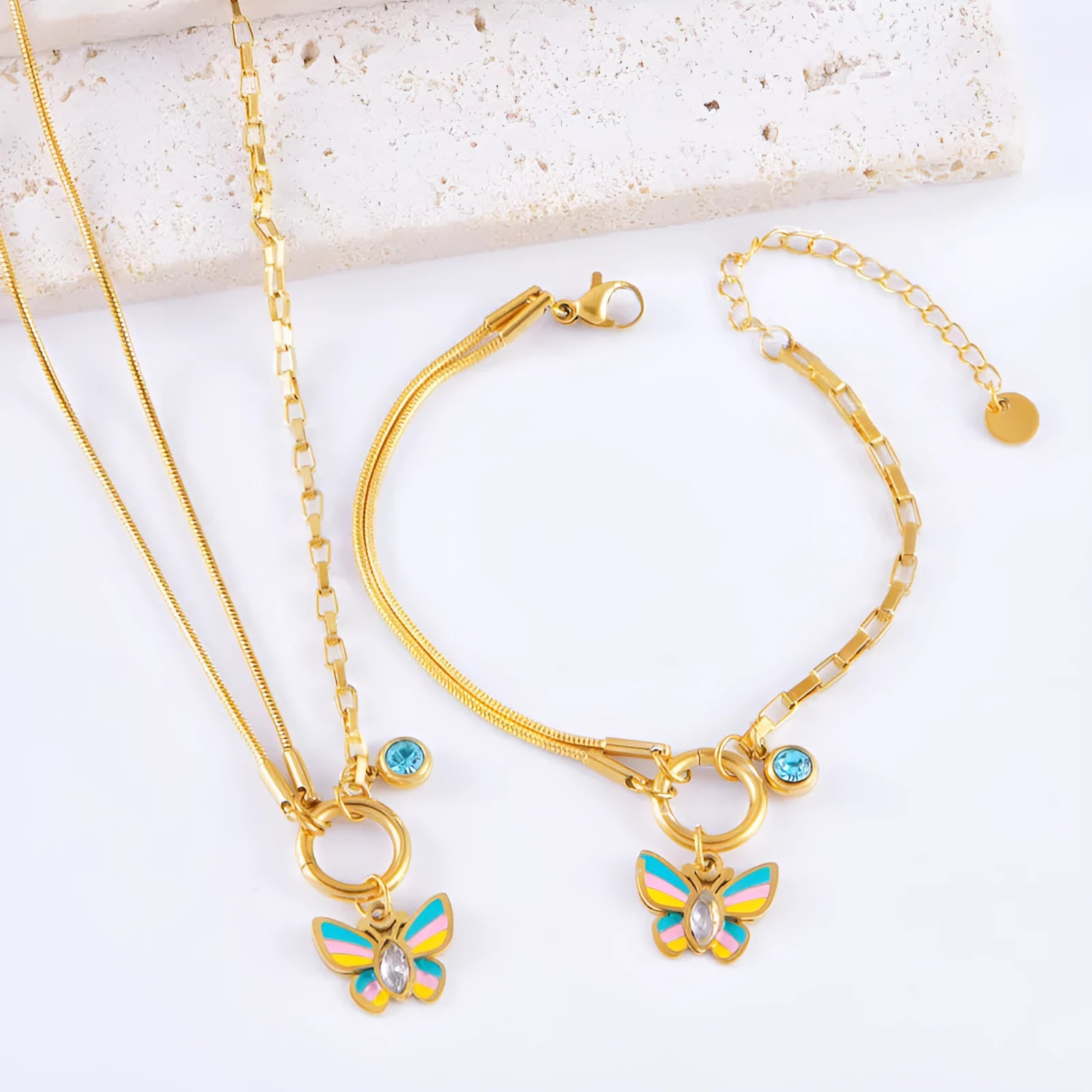 Gold tone epoxy butterfly necklace and bracelet set with snake bone chain.