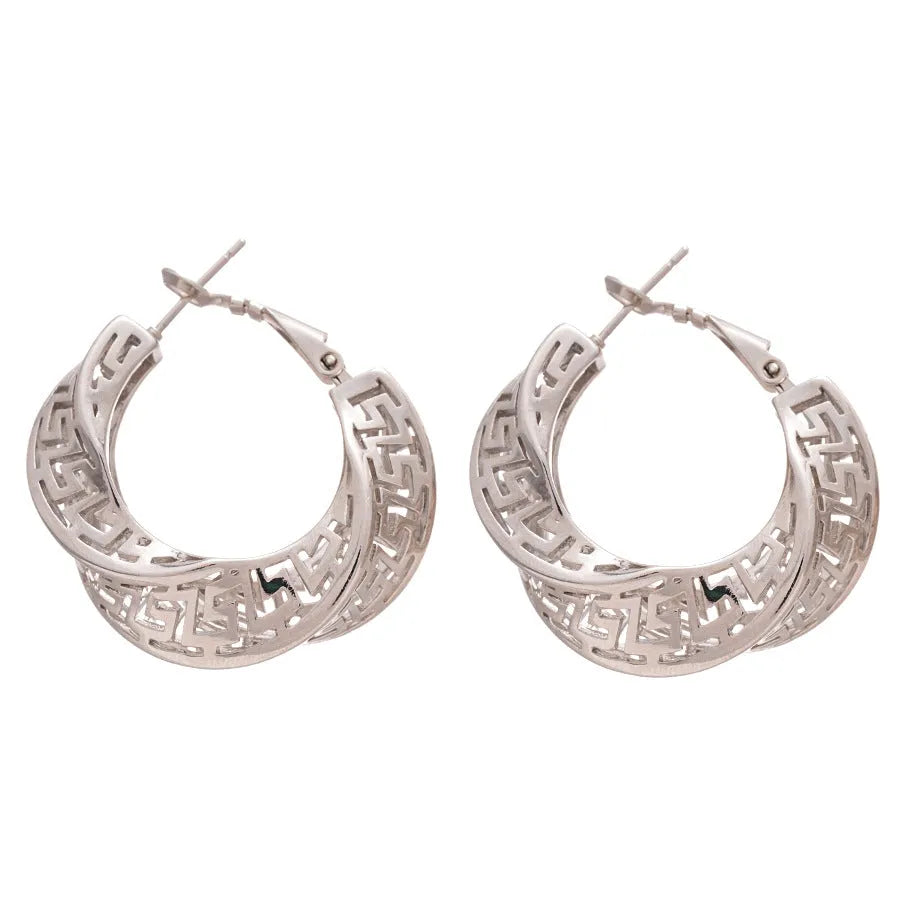 Twisted geometric hollow stud earrings in silver and gold electroplated finishes