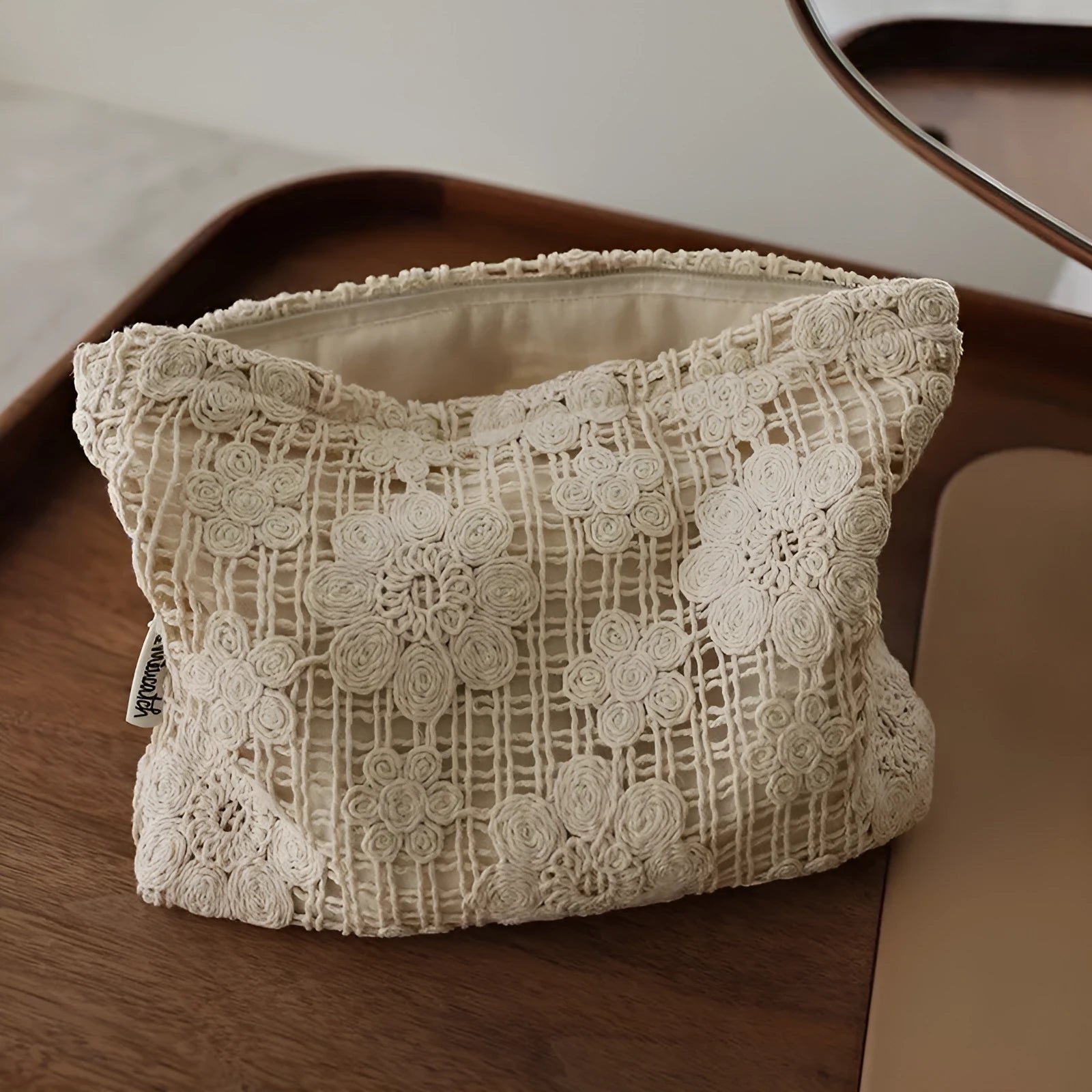 Handmade corduroy cosmetic bag with crocheted hollow flower pattern and ethnic embroidery in rope colour