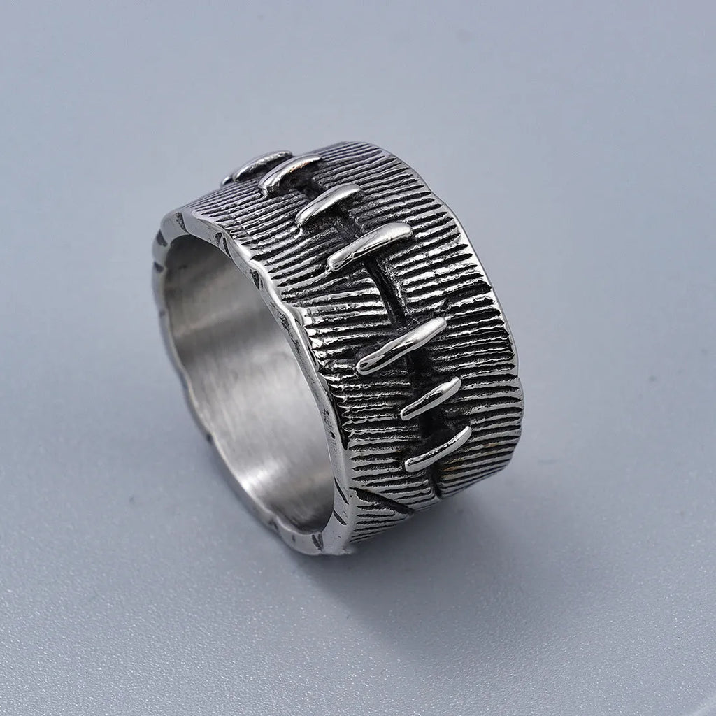 A geometric U-shaped titanium steel punk ring with a double ring design in a retro dark colour.