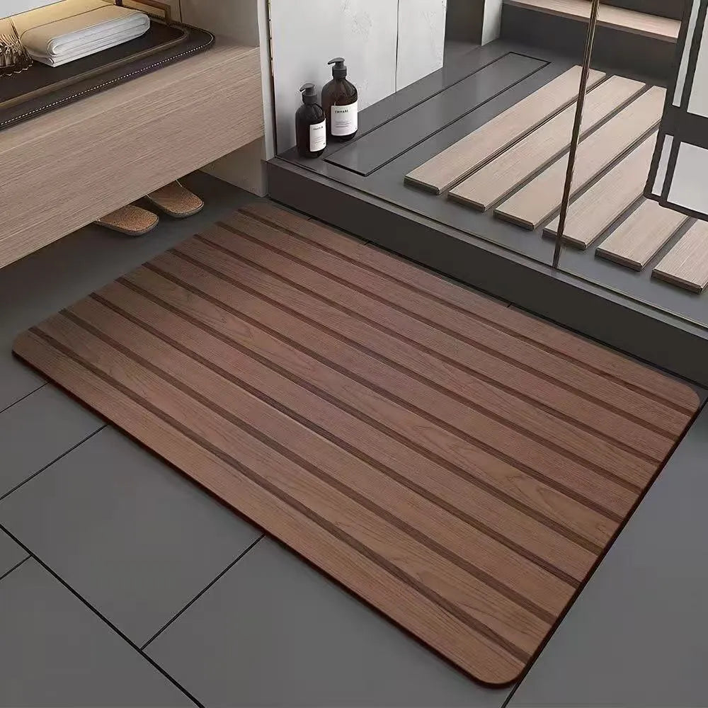 Square American style wood grain patterned diatom ooze bathroom floor mat on a tiled floor.
