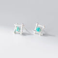 Women's geometric cross quadrangle stud earrings in sterling silver with gold or silver finish.