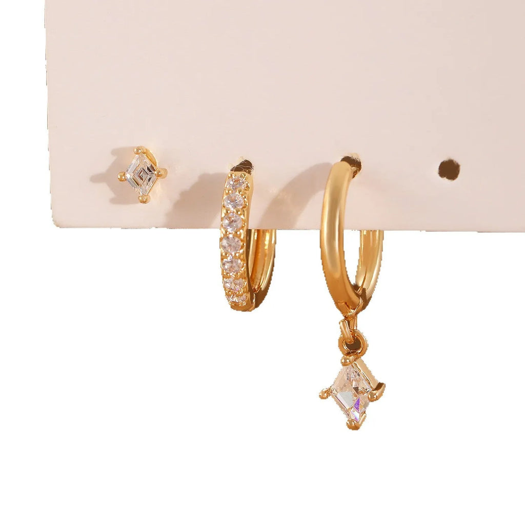 Ladies three-piece earring set with geometric zircon designs in gold and white colours