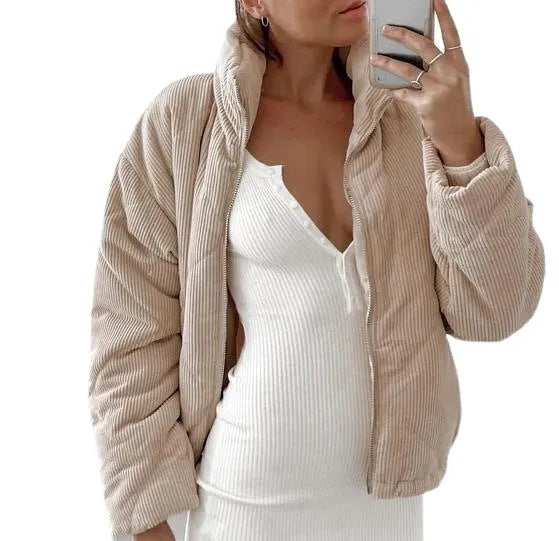 Women's apricot corduroy jacket with stand collar, long sleeves, and full-length zipper closure