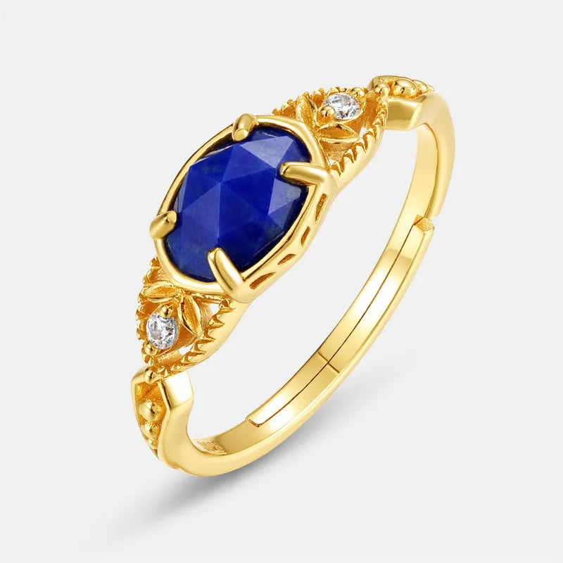 Geometric lapis lazuli silver ring with elliptical shape and round elements