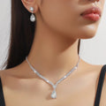 Women's claw chain necklace and earrings set with water drop rhinestones in multiple colour options