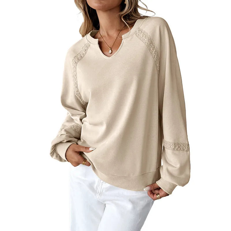 Women's loose long sleeve sweater with half-open lace collar in solid colour.