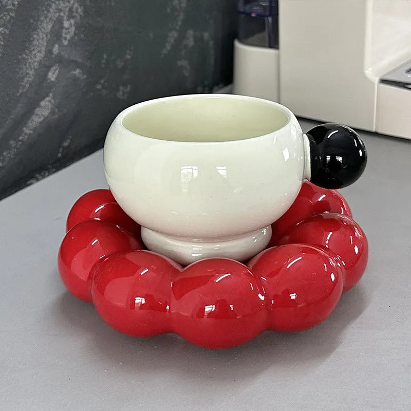 Nordic style ceramic coffee set with a 250ml cup and matching dish on a table.