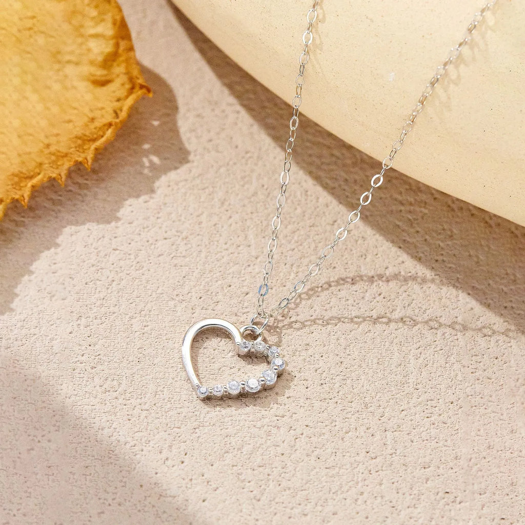 925 sterling silver hollow heart necklace with regular chain, available in white gold or platinum colour