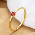 Women's fine copper circle ring with geometric design and single diamond in multiple colour options
