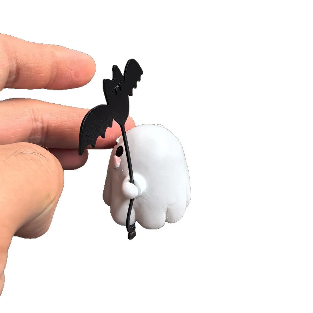 Mini ghost walking dog Halloween statue in resin, ghost holding bat design.
