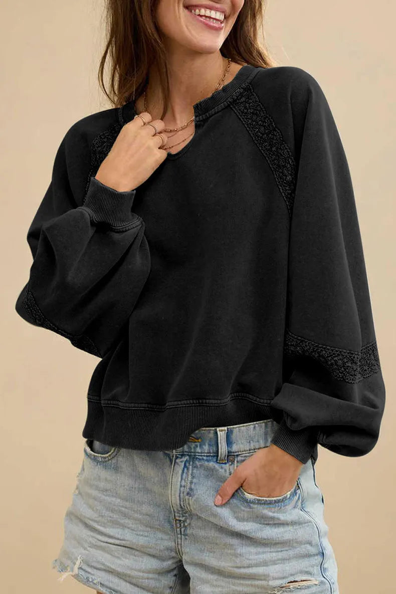 Women's loose long sleeve sweater with half-open lace collar in solid colour.