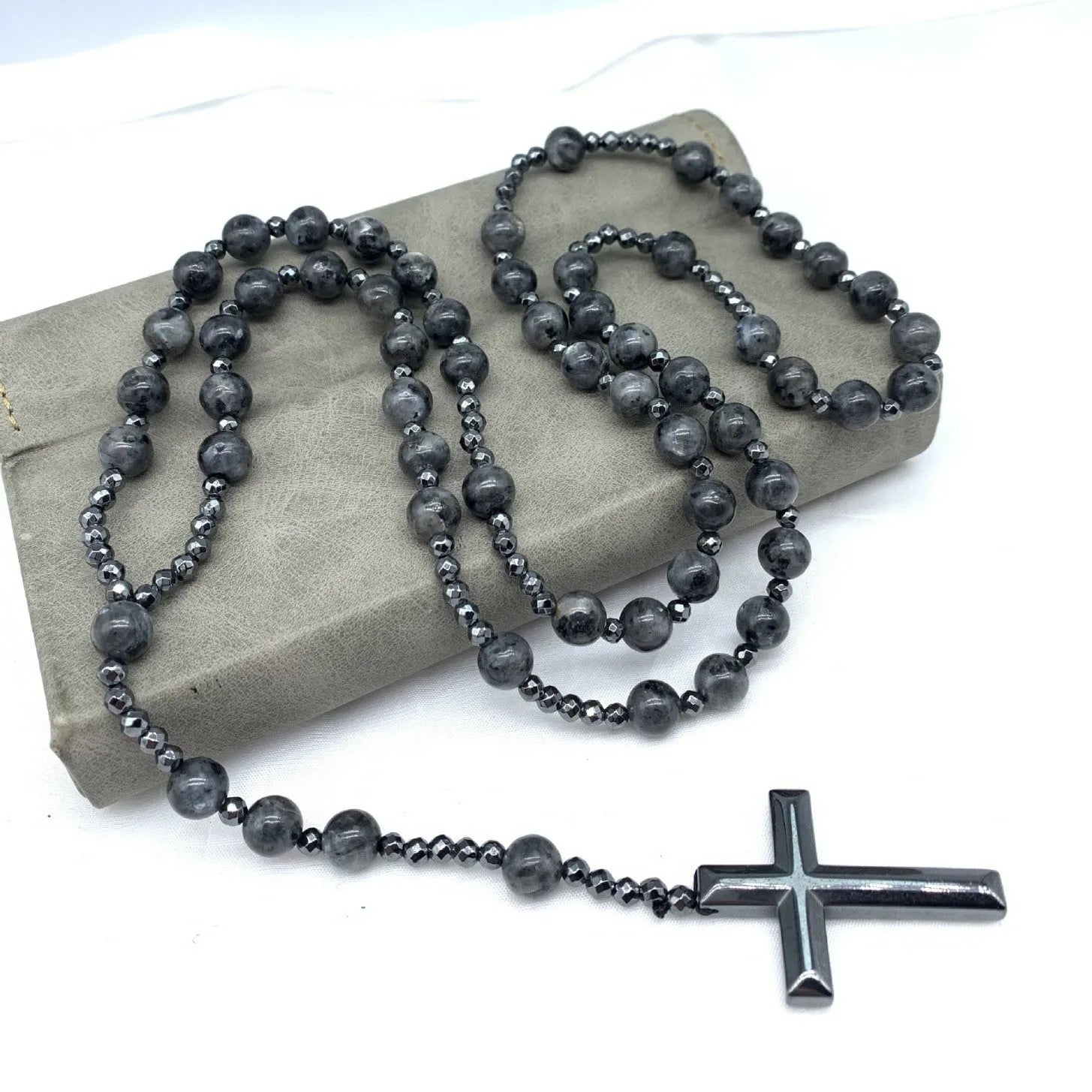 Men's stone cross pendant necklace with hand-woven detail on an 80cm ball bead chain.