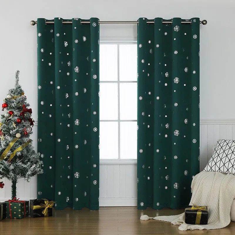 Red polyester snowflake pattern shade cloth curtain with lace loop trim hanging on a window