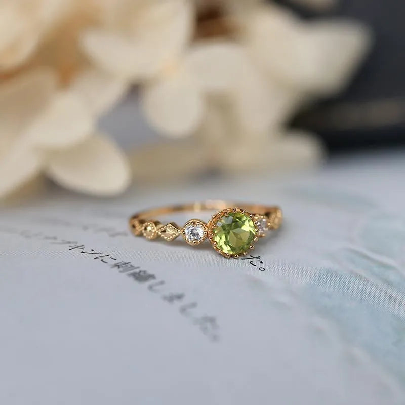 Japanese retro style geometric copper ring with quadrilateral imitation peridot stone.