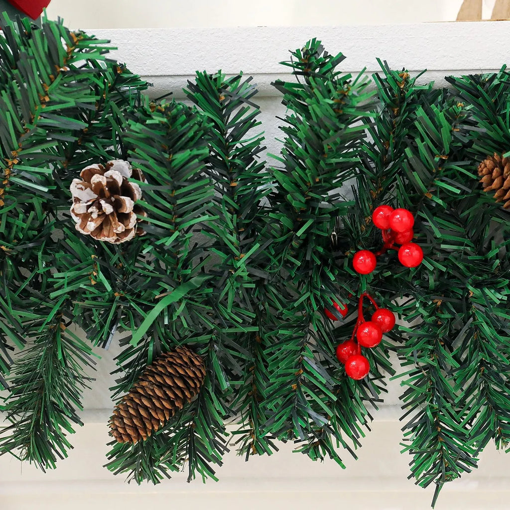 Christmas rattan pine cone bow decorative centrepiece with LED lighting on wooden table